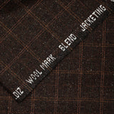 Speckled wool blend with brown background checks
