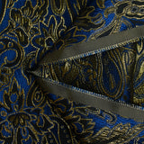 Brocart lamé doré esprit cachemire noir fond bleu roi