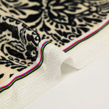 Short velvet jersey with cashmere print and black flower on ivory background