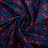 Cotton flannel printed with red deer on navy blue background