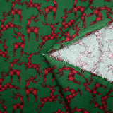 Franela de algodón estampado tartán ciervo rojo sobre fondo verde hierba