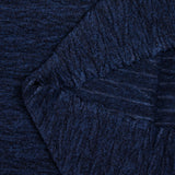 Maille polyester gaufrée et chinée bleu marine et noir