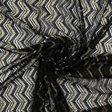 Dentelle polyester chevrons or fond noir