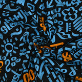 Sergé de coton imprimé graffitis bleu et orange fond noir