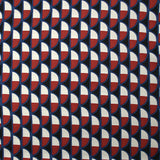 Viscose satin with burgundy half-moon print and black background