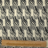 Viscose satin printed with black breath on ecru background