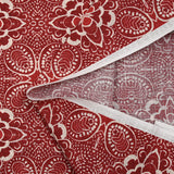 Tejido de algodón con aspecto de lino y estampado arabesco rojo ladrillo.
