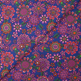 Velours de coton côtelé imprimé fleurs psychédéliques fond indigo