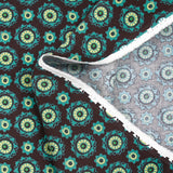 Velours de coton côtelé imprimé rosaces turquoise fond marron