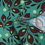 Velours de coton côtelé imprimé feuillage aubergine fond turquoise