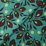 Velours de coton côtelé imprimé feuillage aubergine fond turquoise