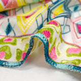 Scalloped embroidered cotton veil Perla duck, green and fuchsia off-white background