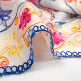 Yrena scalloped embroidered cotton veil in royal blue, orange and fuchsia off-white background