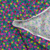 Velours de coton côtelé imprimé petites fleurs colorées fond bleu barbeau