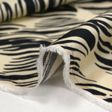 Viscose satin printed with black breath on ecru background