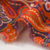 Velours de coton côtelé imprimé cachemire orange fond violet