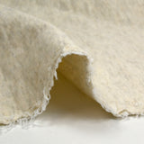 Jersey de coton matelassé écru chiné