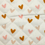 Double-sided quilted cotton polka dots and hearts white background per meter