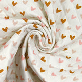 Double-sided quilted cotton polka dots and hearts white background per meter