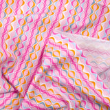 Coton imprimé vague fond rose