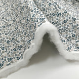 Double-sided quilted cotton Mayla blue flowers white background per meter