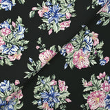 Viscose crepe printed navy flowers and old pink black background