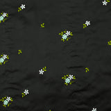 Polyester satin embroidered water green flowers on black background