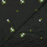 Polyester satin embroidered water green flowers on black background