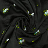 Polyester satin embroidered water green flowers on black background