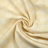 Jacquard de laine mélangée damier écru et crème