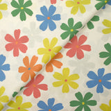 Algodón estampado con flores de Ninon sobre fondo crudo