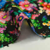 Doublure twill de viscose imprimé champs de fleurs fond noir