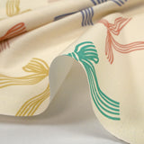 Cotton printed ribbon bows with ecru background