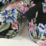 Viscose crepe printed navy flowers and old pink black background