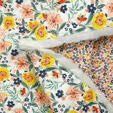 Double-sided quilted cotton Mayla salmon flowers white background per meter