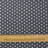 Algodón estampado estrellas 1cm gris