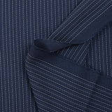 Tissu tailleur 100% laine rayé bleu et blanc fond marine