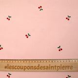 Velours de coton côtelé imprimé cerise fond rose