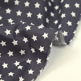 Algodón estampado estrellas 1cm gris