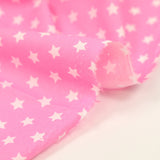 Algodón estampado estrellas 1cm rosa