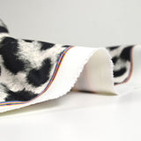SCUBA Touched Swedish print leopard white background