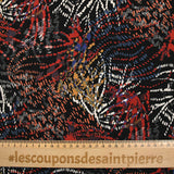 Maille crêpe imprimée feu d'artifice rouge et moutarde fond noir