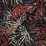 Maille crêpe imprimée feu d'artifice rouge et moutarde fond noir
