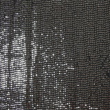 Maille Lurex polyester à paillettes argentées rayées fond noir