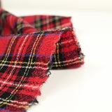 100% wool tartan cheesecloth red background