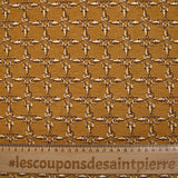 Jersey de viscose imprimé enchaîné fond ocre