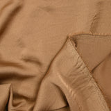 Crêpe satin de polyester mordoré
