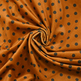 Velours ras imprimé pois fond orange brûlé