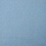 Cotton chambray decorated with rhinestones on a sky blue background