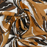 Viscose crepe with brown jungle print and white background